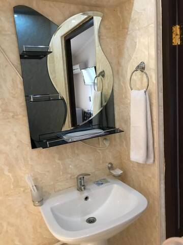 Фото номера Cемейный номер с собственной ванной комнатой Отель Armenia VanSevan Hotel г. Севан 6